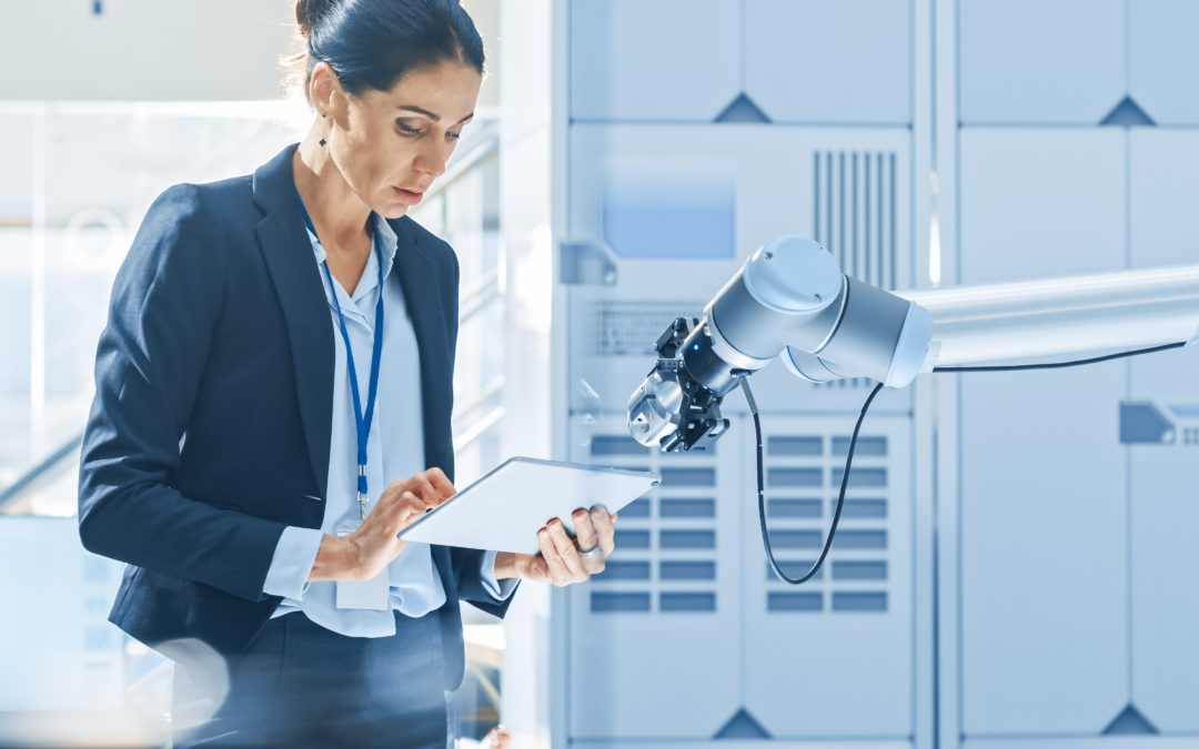 A worker collaborating a cobot.